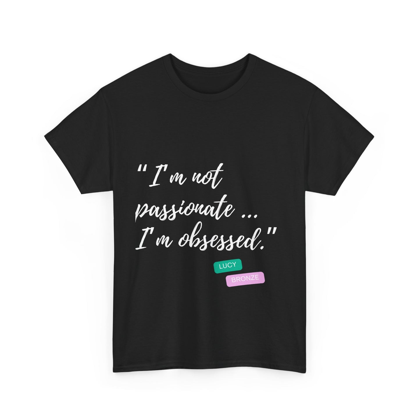 Unisex heavy cotton T-shirt with bold “Not Passion. Obsession.” text design, inspired by the ethos of being Unapologetically Obsessed. Available in charcoal, black, light pink, navy, and sport grey. Emphasizes quality, comfort, and the story of autism and ADHD empowerment tied to the Lioness icon.