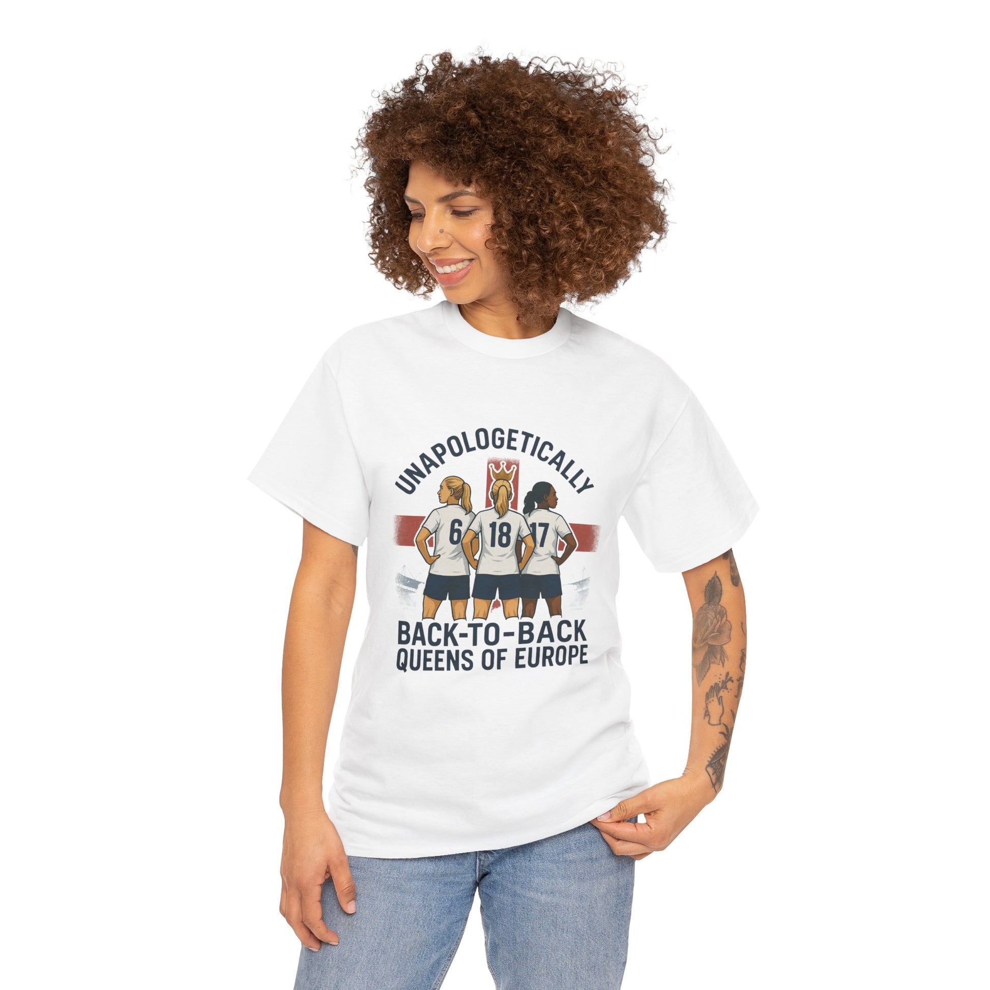 Unisex t-shirt celebrating the England Lionesses' UEFA Euro 2025 victory, featuring a bold graphic of three players in front of the St. George’s Cross. A standout piece of women’s football merch with the slogan ‘Unapologetically Lionesses – Back-to-Back Queens of Europe.’