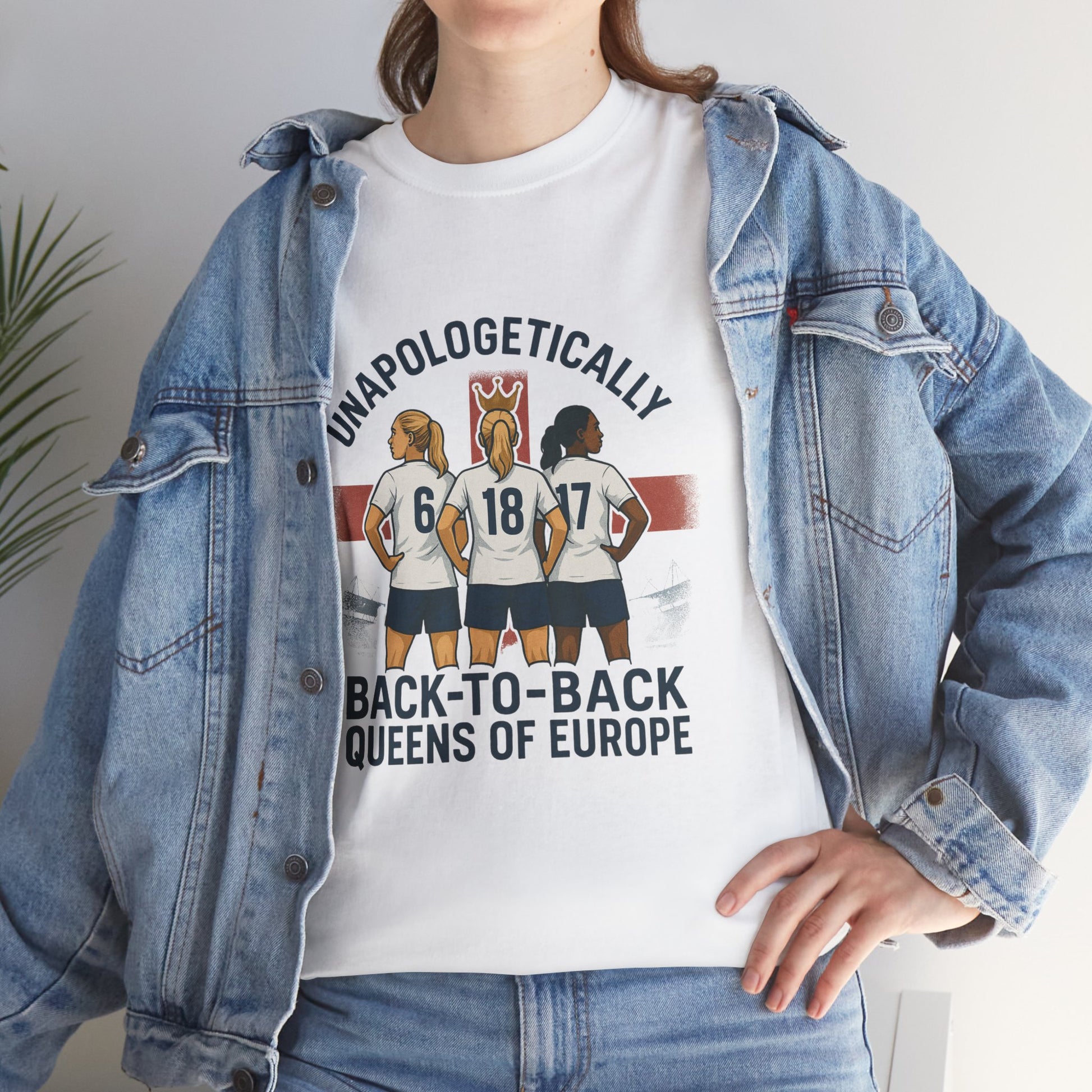 Unisex t-shirt celebrating the England Lionesses' UEFA Euro 2025 victory, featuring a bold graphic of three players in front of the St. George’s Cross. A standout piece of women’s football merch with the slogan ‘Unapologetically Lionesses – Back-to-Back Queens of Europe.’
