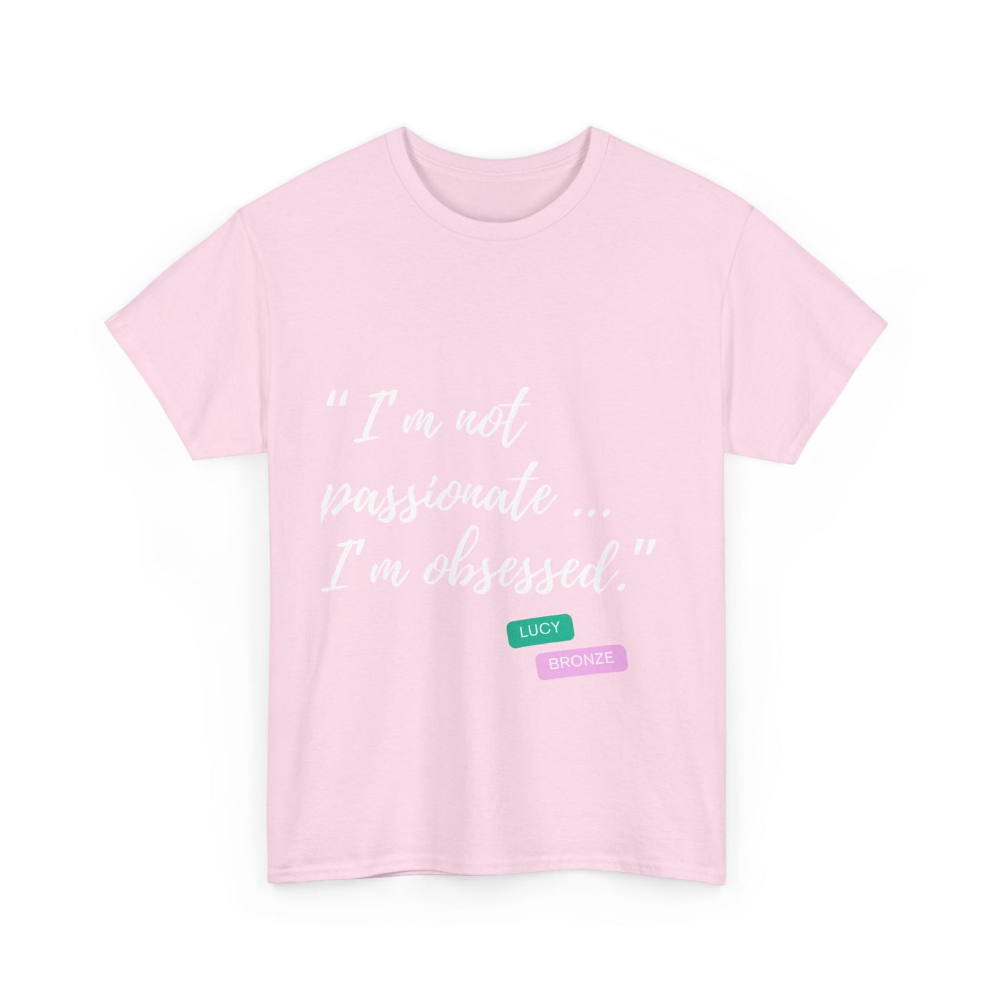 Unisex heavy cotton T-shirt with bold “Not Passion. Obsession.” text design, inspired by the ethos of being Unapologetically Obsessed. Available in charcoal, black, light pink, navy, and sport grey. Emphasizes quality, comfort, and the story of autism and ADHD empowerment tied to the Lioness icon.